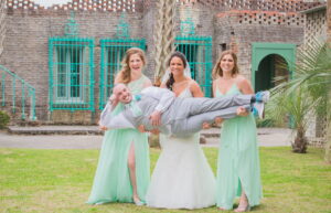 Fun bridal photos at wedding ceremony in Atalaya Castle in Huntington Beach State Park